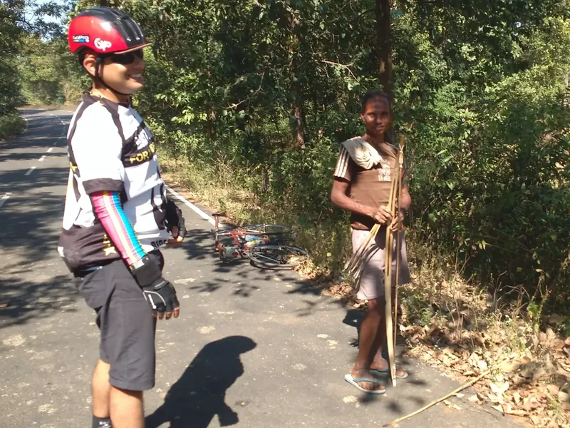 "Can I try that bow?" Meeting a tribal hunter near Maredumilly heading to the forest for wild boar
