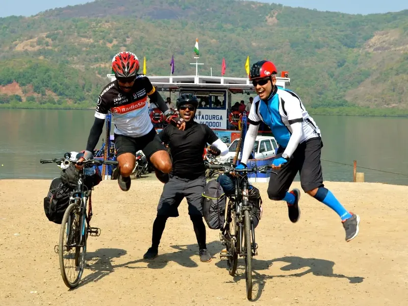 Mumbai to Goa self supported tour. Krish A, Rajiv and Varun (left to right) after a ferry crossing